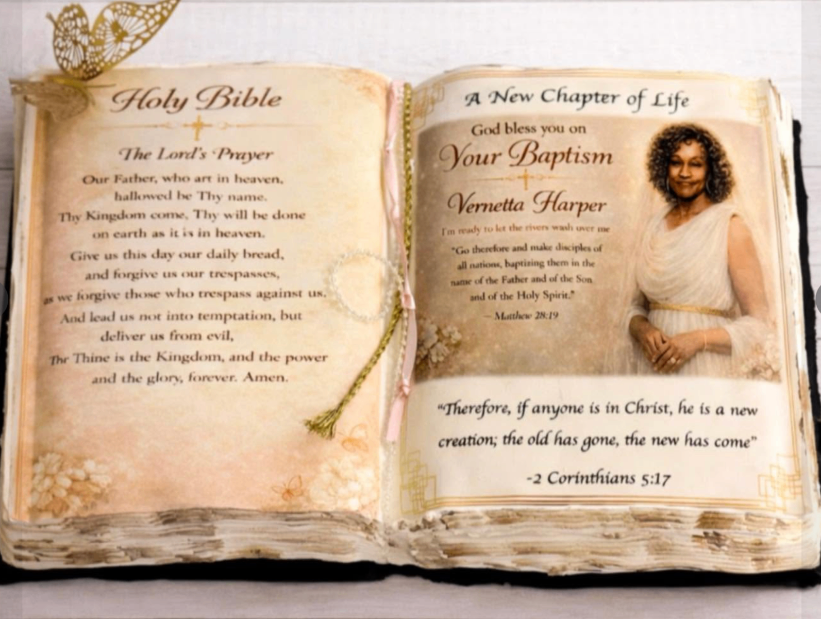 Open Bible baptism cake with The Lord's Prayer, scripture, and an edible portrait by Mooville Bakery.
