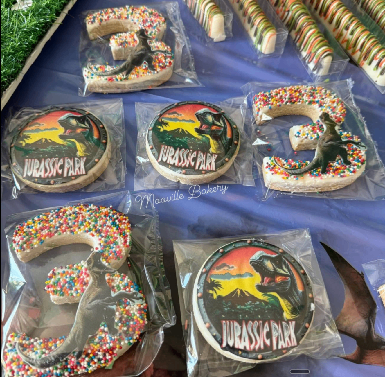 Custom logo and themed edible image cookies by Mooville Bakery.