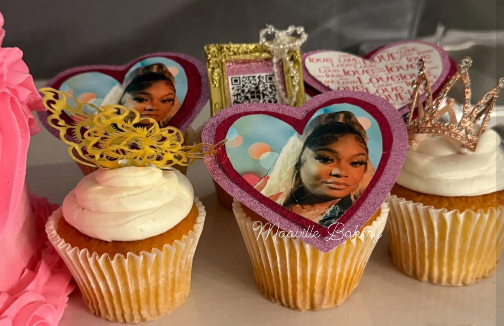 Custom edible photo cupcake toppers by Mooville Bakery.